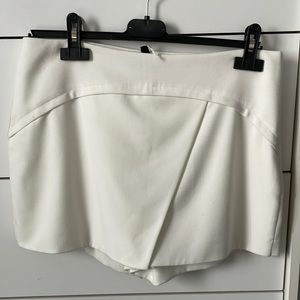 BCBG short in Med cream color. Barely worn. Stunning piece for day to night time